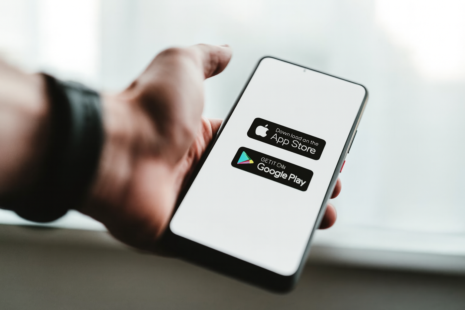 A phone and laptop side-by-side showing the same branded web application, signifying instant cross-platform deployment.